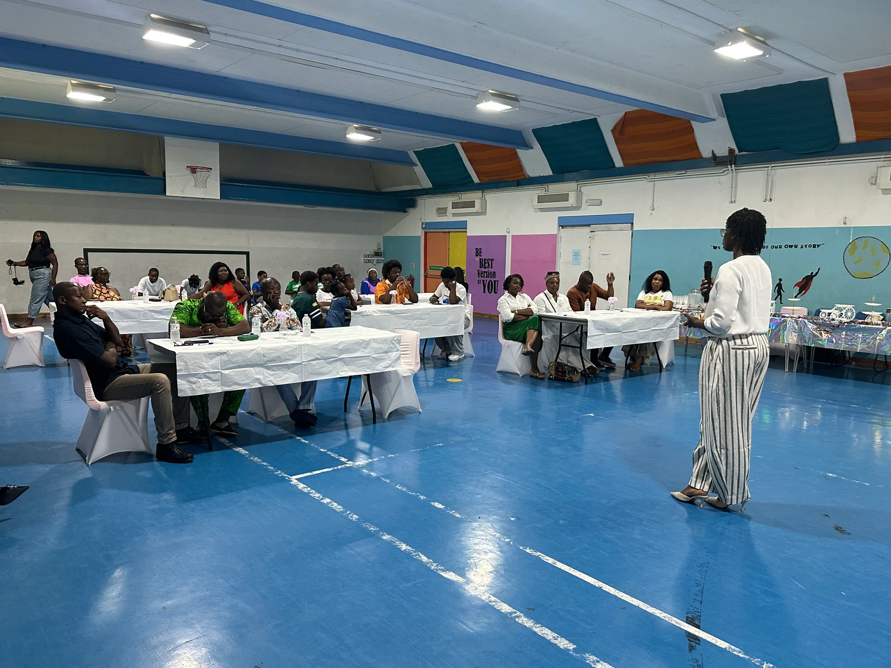 A HopingHands speaker sharing information with families at the official launch