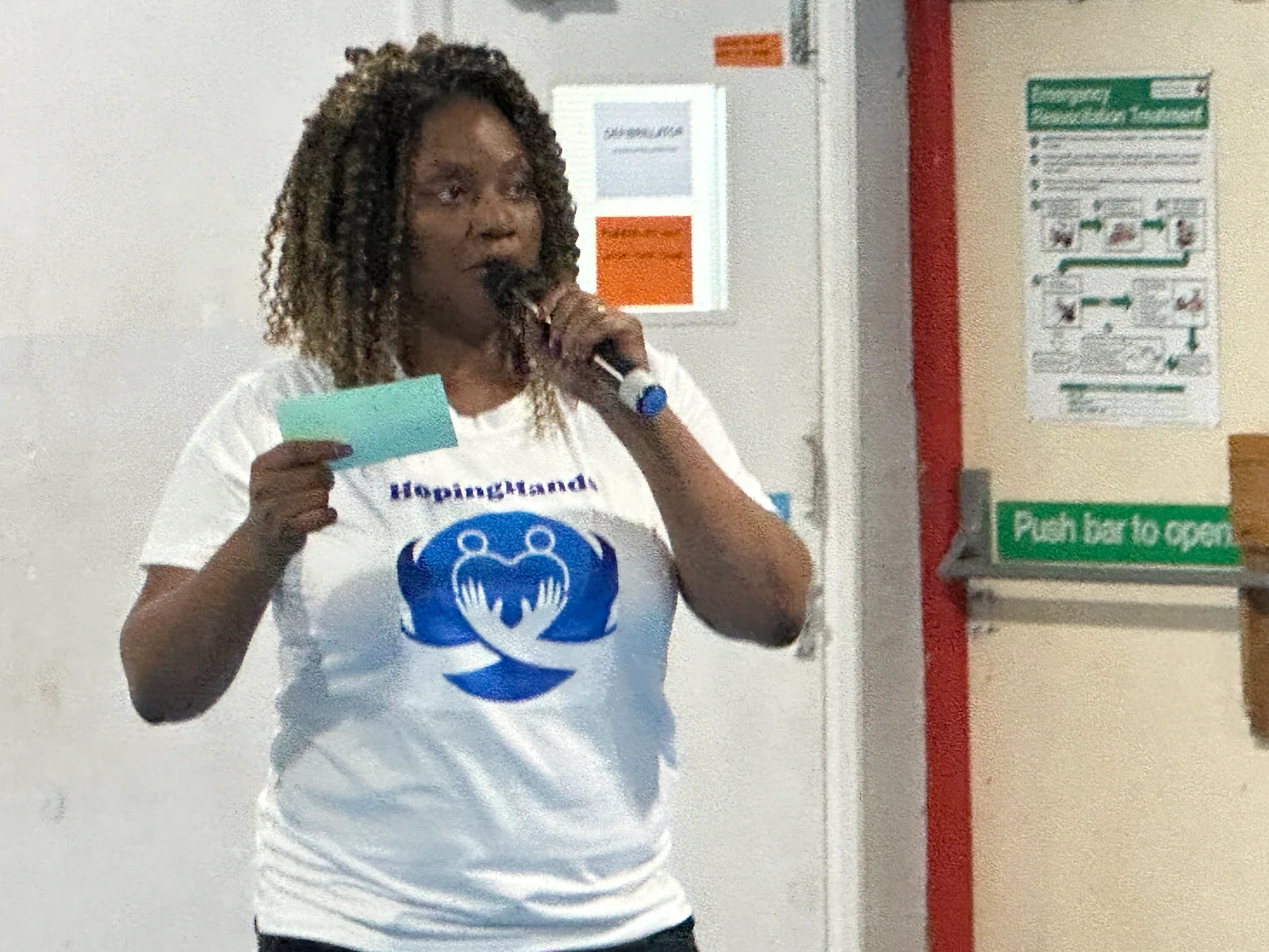 A community speaker being heard during the HopingHands launch